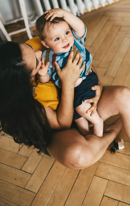 mom playing with baby 